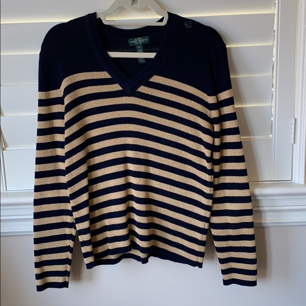 Knit shimmery sweater.